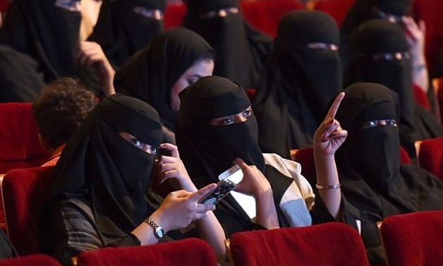 Saudi women attend a short film festival at King Fahd Culture Center in Riyadh on October 20, 2017. (AFP Photo/Fayez Nureldine)