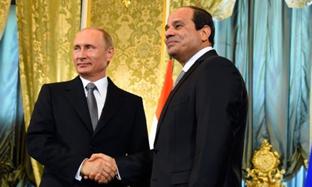 Sisi (R) welcomes Putin (L) in Egypt in November 2015- File phtoto