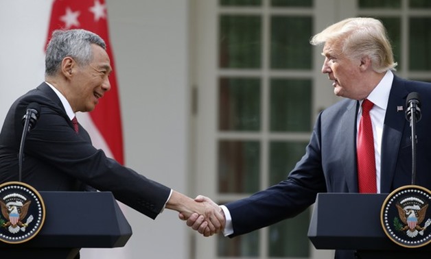 U.S. President Trump and Singapore Prime Minister Lee give joint statements at the White House in Washington -- REUTERS