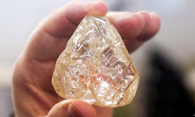 A 709-carat diamond, found in Sierra Leone and known as the "Peace Diamond", is displayed during a tour ahead of its auction, at Israel's Diamond Exchange, in Ramat Gan, Israel, Oct. 19, 2017.