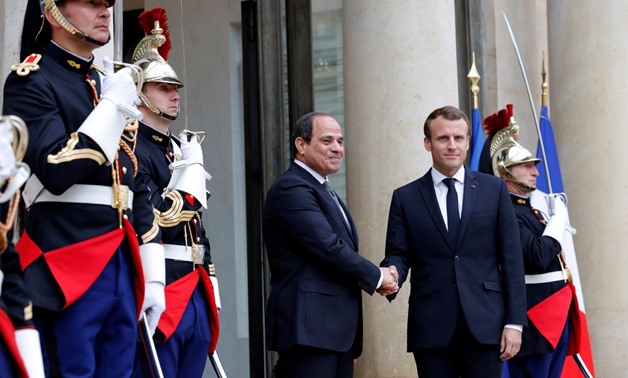 President Abdel Fatah al-Sisi and French President Emmanuel Macron during reception ceremony outside the Elysee Palace -   French President Emmanuel Macron receives President Abdel Fatah al-Sisi at the Elysee Palace Tuesday Oct.24, 2017 - Reuters