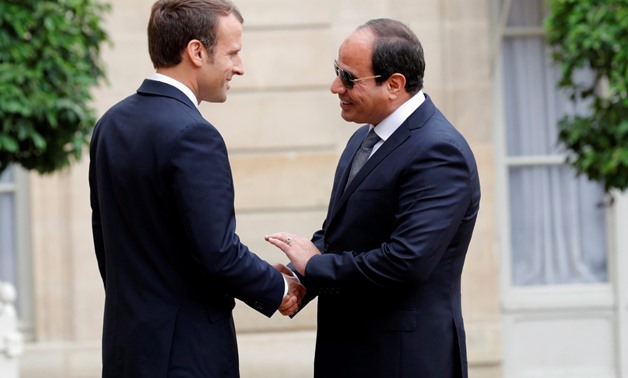 French President Emmanuel Macron receives President Abdel Fatah al-Sisi at the Elysee Palace Tuesday Oct.24, 2017 - Reuters