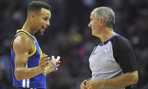 Golden State Warriors guard Stephen Curry (30) talks with referee Scott Wall – Press image courtesy Reuters