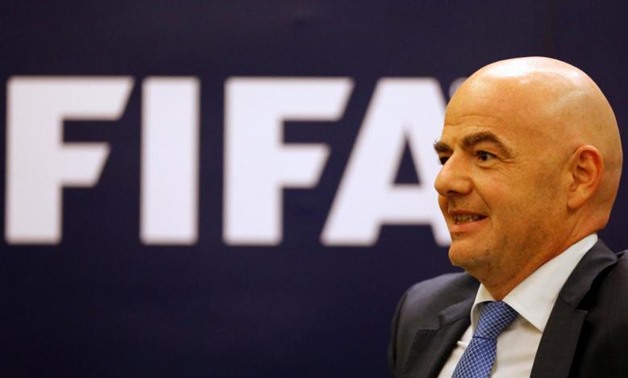 FIFA President Gianni Infantino arrives at a news conference in Bangkok - Reuters
