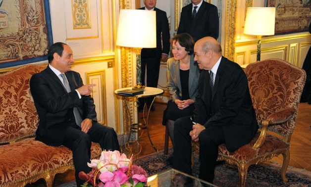 Egyptian President Abdel Fatah al-Sisi with French Foreign Minister Jean-Yves Le Drian - press photo