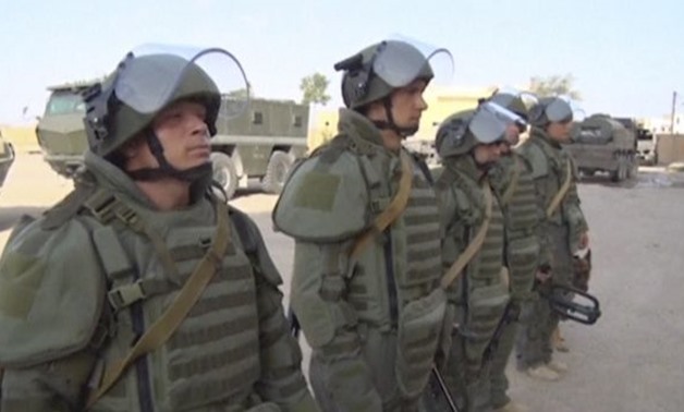 A still image taken from a video footage and released by Russia's Defence Ministry on September 29, 2017, shows Russian military de-mining engineers at work in Deir al-Zor, Syria. Russian Defence Ministry/Handout via REUTERS