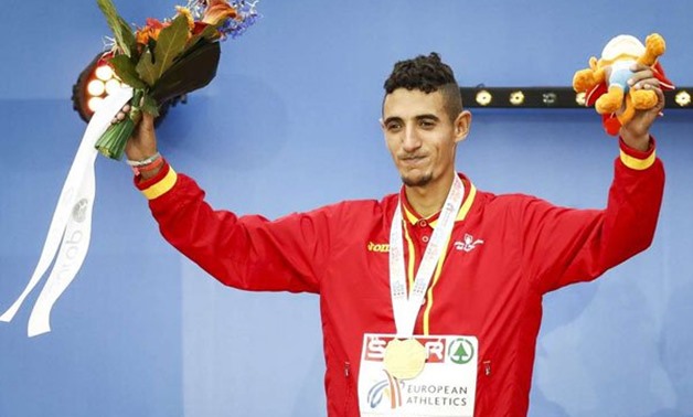Fifa celebrating during the medal ceremony of the men's 5000m final at the European Athletics Championships at the Olympic Stadium in Amsterdam on July 10, 2016. Spain's Ilias Fifa, European champion of the 5,000m race in 2016, was detained on October 25,
