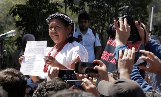 Maria de Jesus Patricio Martinez, an indigenous woman backed by Mexico's Zapatista National Liberation Army (EZLN), shows a document after she registered to run as an independent candidate - REUTERS
