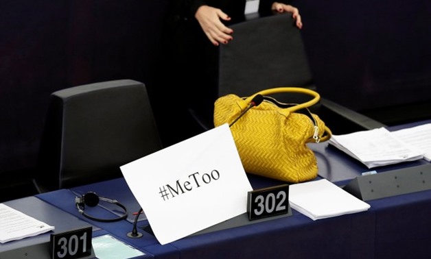 A placard with the hashtag "MeToo" is seen on a European Parliament member's desk in Strasbourg - REUTERS
