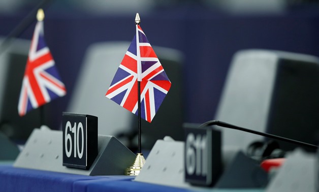 British Union Jack flags are seen on the desk of members of the European Parliament during a debate on the outcome of the last European summit at the European Parliament in Strasbourg, France -  REUTERS/Christian Hartmann