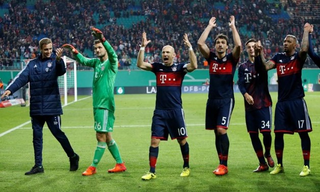 Soccer Football - DFB Cup Second Round - RB Leipzig v Bayern Munich - Red Bull Arena, Leipzig, Germany - Bayern Munich players celebrate winning - Reuters