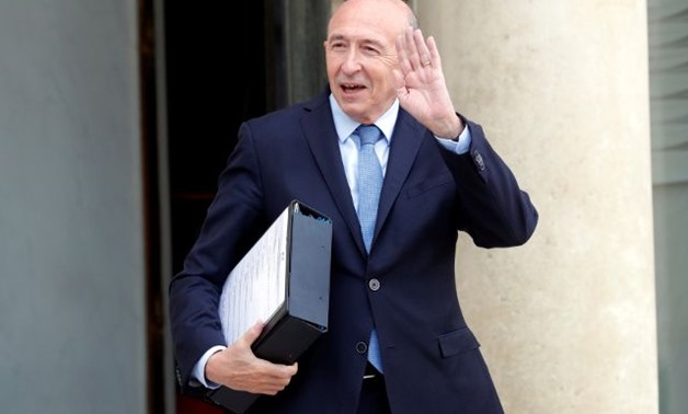 French Interior Minister Gerard Collomb leaves after the weekly cabinet meeting at the Elysee Palace in Paris - REUTERS