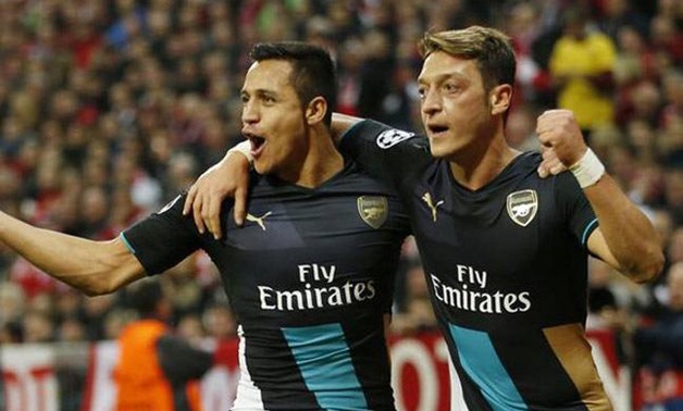Mesut Ozil and Alexis Sanchez - Reuters