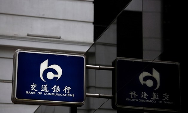 A logo of China's Bank of Communications is displayed outside its branch at the financial Central district in Hong Kong - REUTERS