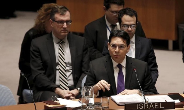 Israel's Ambassador to the United Nations Danny Danon addresses a United Nations Security Council meeting on the Middle East at U.N. headquarters in New York - REUTERS