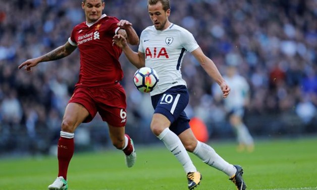 Tottenham's Harry Kane in action with Liverpool's Dejan Lovren REUTERS