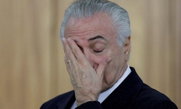 Brazilian President Michel Temer reacts during a credentials presentation ceremony for several new top diplomats at Planalto Palace in Brasilia - Reuters

