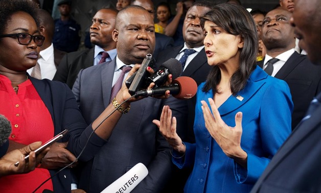 U.S. Ambassador to the United Nations Nikki Haley and President of Congo's electoral commission (CENI) Corneille Nangaa (C) addresses the media at the CENI headquarters in Gombe, Kinshasa, Democratic Republic of Congo, October 27, 2017. REUTERS/Robert Car