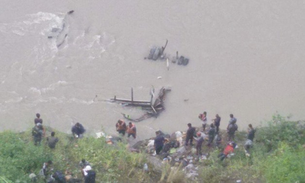 The security personnel deployed from Chitwan District Police Office in search and rescue operation for the passengers of the bus that plunged into Trishuli River near Kalikhola along the Narayangadh Munglin road section on Friday, August 26, 2016. Photo: 