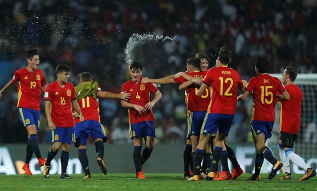 Spain's team celebrates their win against Mali in the semi finals - REUTERS