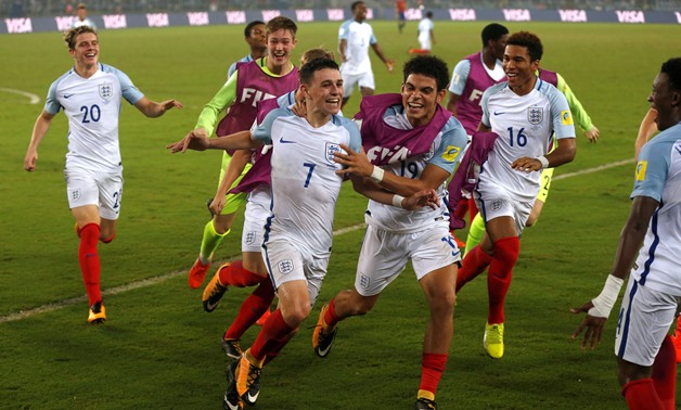 England’s Philip Foden celebrates scoring a goal with teammates - REUTERS