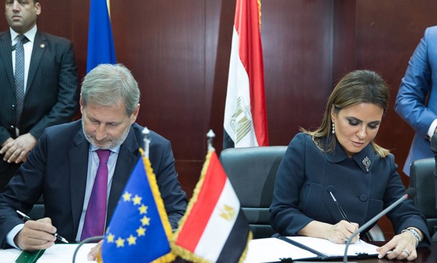 Commissioner for Neighborhood Policy and Enlargement Negotiations, European Commission, Johannes Hahn and Egyptian Minister of Investment and International Cooperation, Sahar Nasr- Press Photo