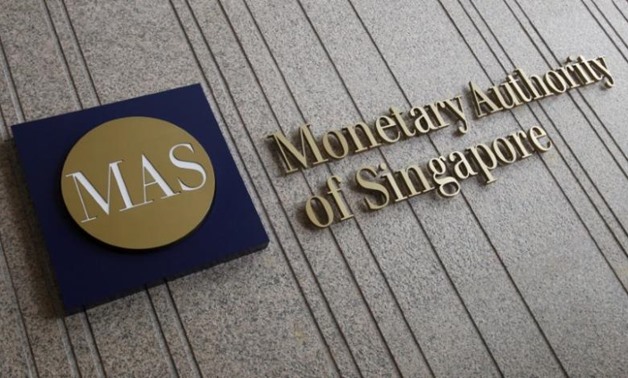 The logo of the Monetary Authority of Singapore (MAS) is pictured at its building in Singapore in this February 21, 2013 file photo. REUTERS/Edgar Su/File Photo