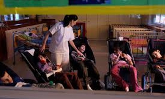 A nurse takes care of children with disabilities at the Centre for the Protection of Infants, Children and Youth in Belgrade, Serbia June 8, 2016. REUTERS/Marko Djurica