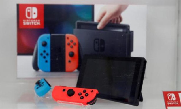 A Nintendo Switch game console is displayed at an electronics store in Tokyo, Japan. Reuters
