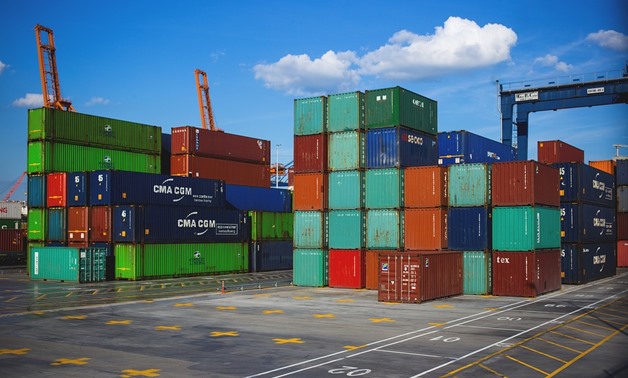 FILE - Containers in a seaport - REUTERS