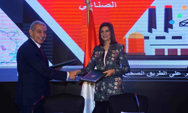 Minister of Industry Tarek Kabil and Minister of Immigration Nabila Makram signed MoU Tuesday- File Photo