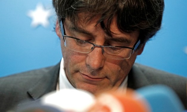 Sacked Catalan leader Carles Puigdemont attends a news conference in Brussels - REUTERS