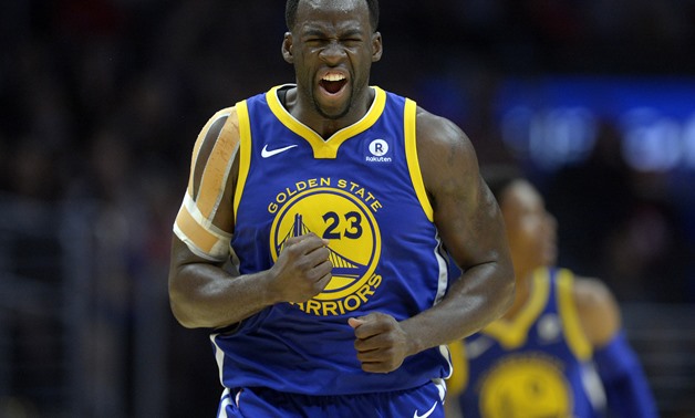 Golden State Warriors forward Draymond Green (23) reacts after scoring a three point basket against the Los Angeles Clippers during the second half at Staples Center. Mandatory Credit: Gary A. Vasquez-USA TODAY Sports