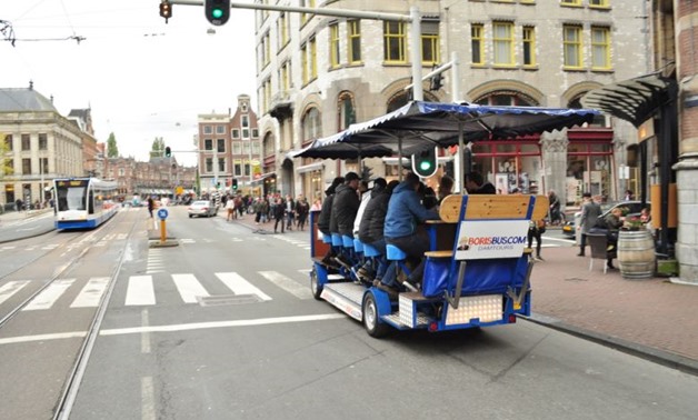 Beer bicycles have become a popular way - especially for tourists celebrating group events, such as stag parties - to travel around Amsterdam.PHOTO: BEERBIKE.CO.UK