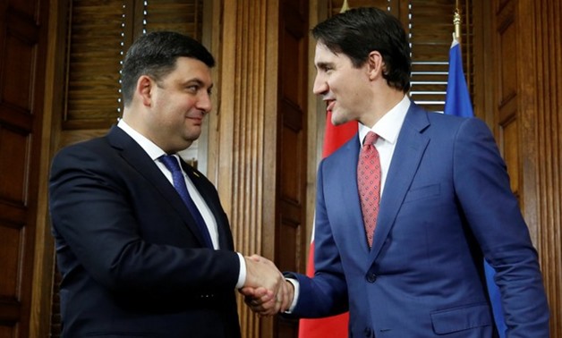 Canada's PM Trudeau shakes hands with his Ukrainian counterpart Groysman in Ottawa - REUTERS