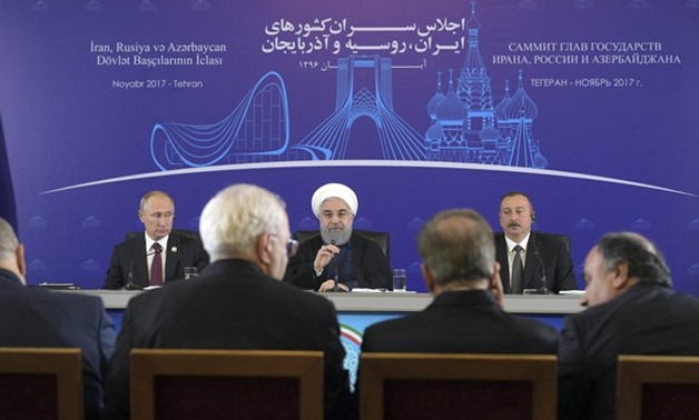 Russia's President Putin, Iran's President Rouhani and Azerbaijan's President Aliyev attend a news conference in Tehran - REUTERS