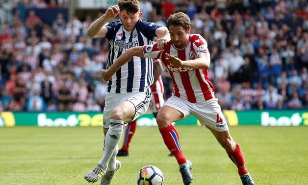 West Bromwich Albion's Oliver Burke in action with Stoke City's Joe Allen REUTERS/Andrew Yates