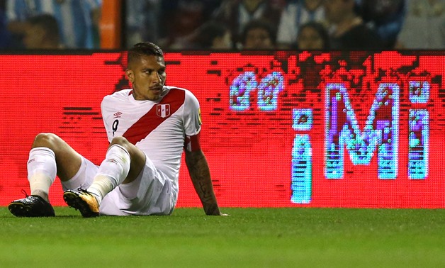 Peru's Paolo Guerrero sits on the field. Picture taken October 5, 2017. REUTERS/Marcos Brindicci