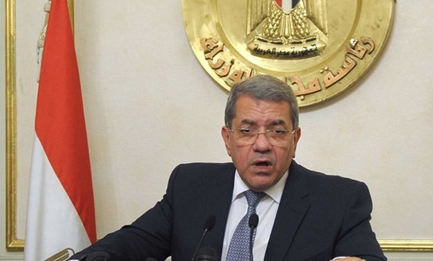 FILE - Minister of Finance Amr El-Garhy