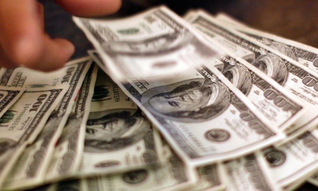 U.S. Dollar Bills - Reuters/Rick Wilking