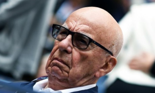 Rupert Murdoch, seen at the 2017 US Open tennis tournament in September, has reportedly held talks to sell part of his 21st Century Fox group to media-entertainment rival Disney - AFP