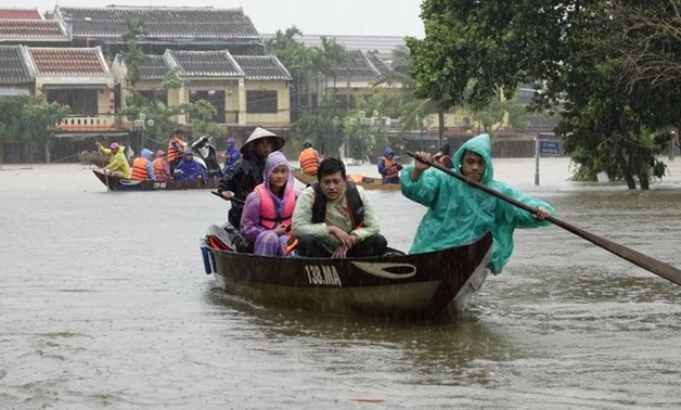 FERRIED. Residents and tourists are transported by boats through floodwaters in the tourist town of Hoi An on November 5, 2017, one day after Typhoon Damrey made landfall in central Vietnam. Stringer - AFP