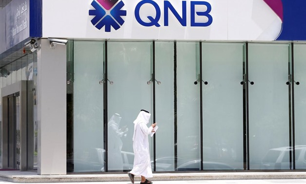 A man walks past a branch of Qatar National Bank (QNB) in Riyadh, Saudi Arabia, June 5, 2017 - REUTERS/Faisal Al Nasser