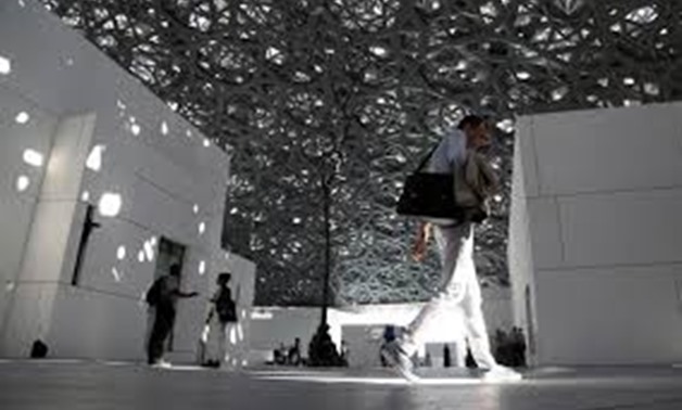 People are seen at the Louvre Abu Dhabi in Abu Dhabi, United Arab Emirates, November 6, 2017. REUTERS/Satish Kuma