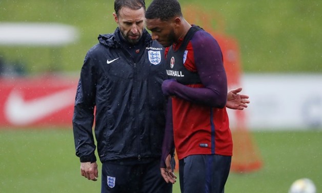 Soccer Football - England Training - St. George's Park, Burton upon Trent, Britain - November 7, 2017 England manager Gareth Southgate and Joe Gomez during training Action Images via Reuters/Carl Recine