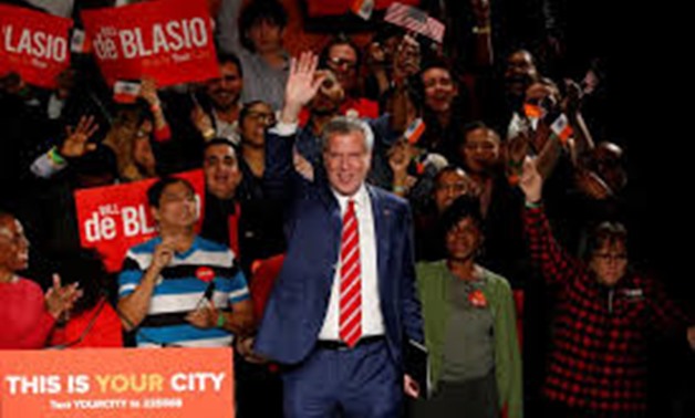 New York Mayor Bill de Blasio is greeted by supporters after his re-election in New York City, U.S. November 7, 2017. REUTERS/Brendan McDermid
