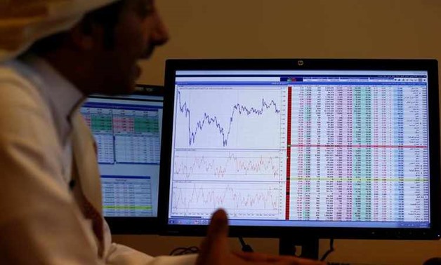 An investor gestures as he monitors a screen displaying stock information in Riyadh, Saudi Arabia, November 6, 2017.
REUTERS/Faisal Al Nasser