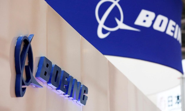 Boeing's logo is seen during Japan Aerospace 2016 air show in Tokyo, Japan, October 12, 2016. REUTERS/Kim Kyung-Hoon