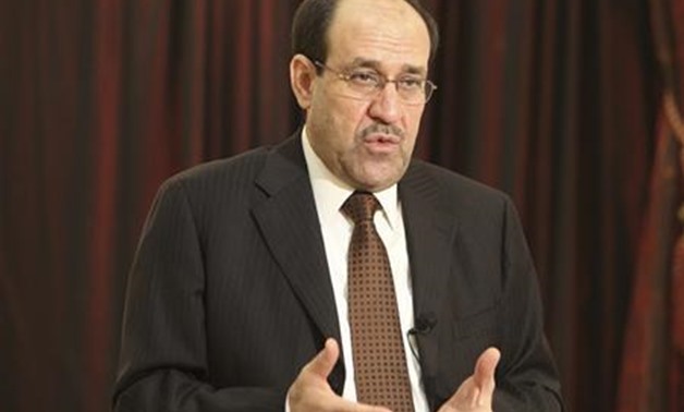 Iraq's Prime Minister Nuri al-Maliki speaks during an interview with Reuters in Baghdad - REUTERS