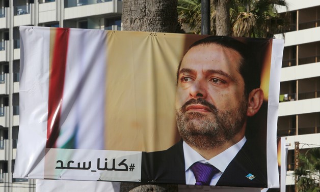 A poster depicting Lebanon's Prime Minister Saad al-Hariri, who has resigned from his post, is seen in Beirut, Lebanon, November 10, 2017. REUTERS/Aziz Taher 